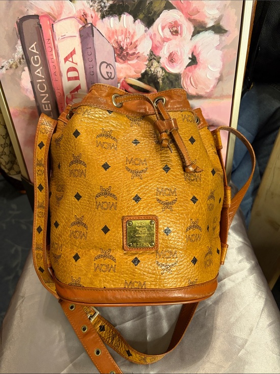 MCM Handbags - MCM Cognac Visetos Monogram Drawstring Crossbody Bucket Bag